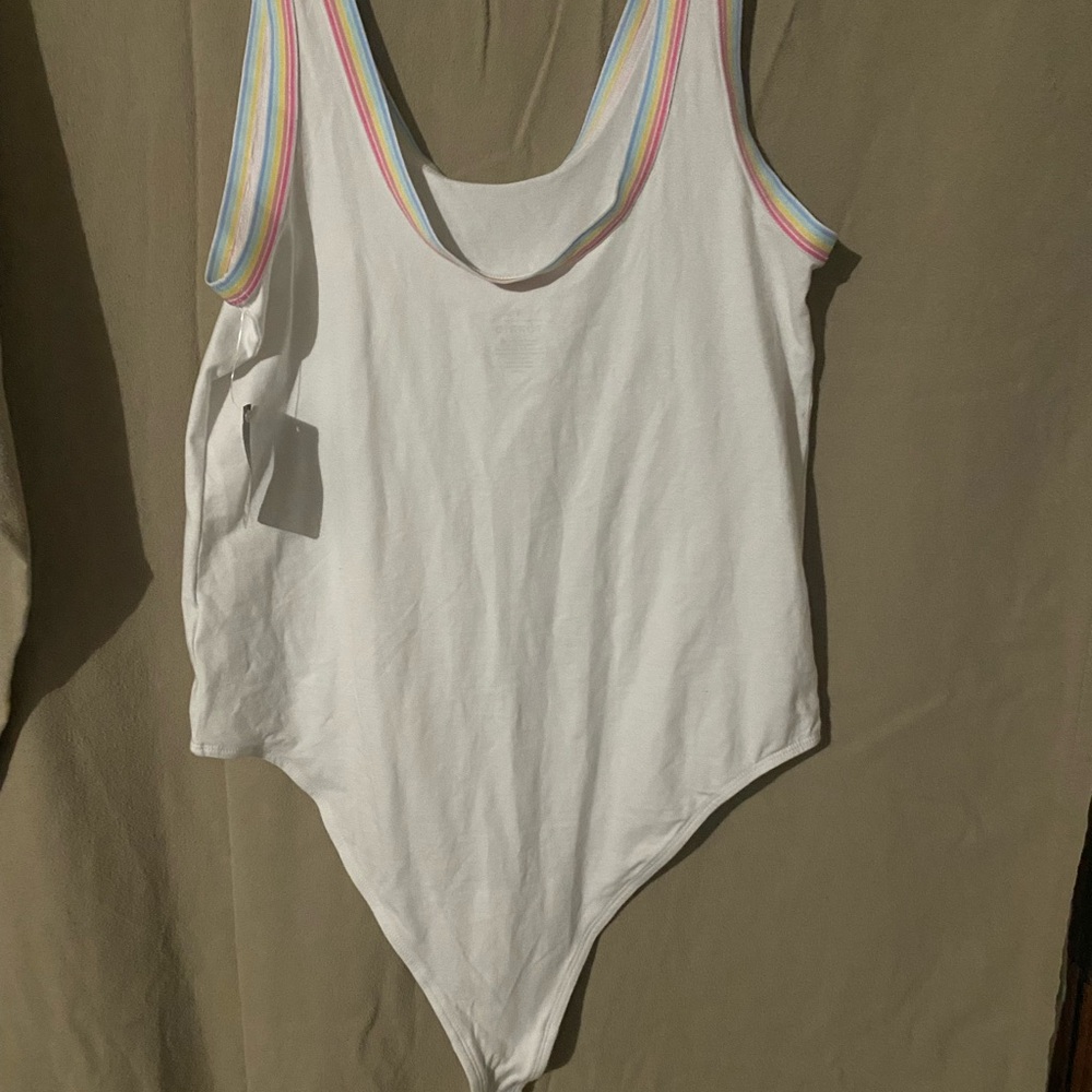 NWT White Torrid one Piece with Rainbow Trim. Size 1